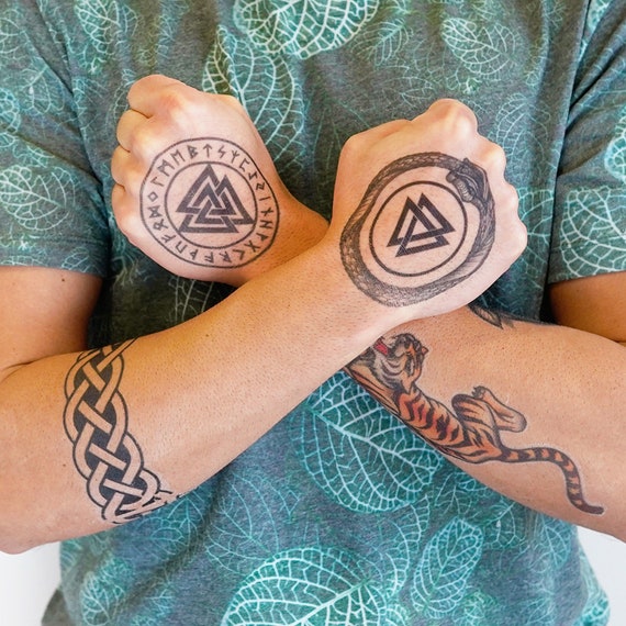 Harsh Tattoos - Wrist Band with three triangles Meaning: three interlocking  triangles known as Valknut were said to protect warriors in battlefield ...  . . Check out the amazing tattoo by Harsh