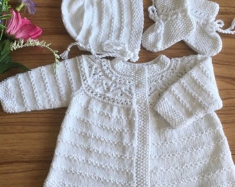 Handmade knitted baby sweater/cardigan/jacket/ with matching booties and hat/bonnet/white/baby shower gift