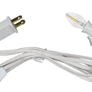 May include: A white electrical cord with a plug, an inline on/off switch, and a clear light bulb in a white clip. The cord is bundled and tied. The plug has two flat prongs and a grounding pin.