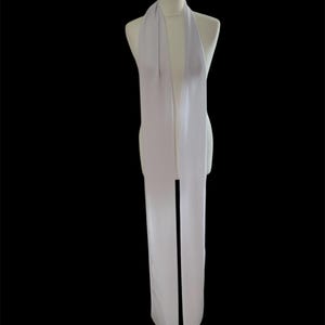 May include: A long, flowing, light lavender scarf draped over a white mannequin. The scarf is made of a sheer fabric, with a soft, delicate appearance. The scarf hangs down in two long panels.