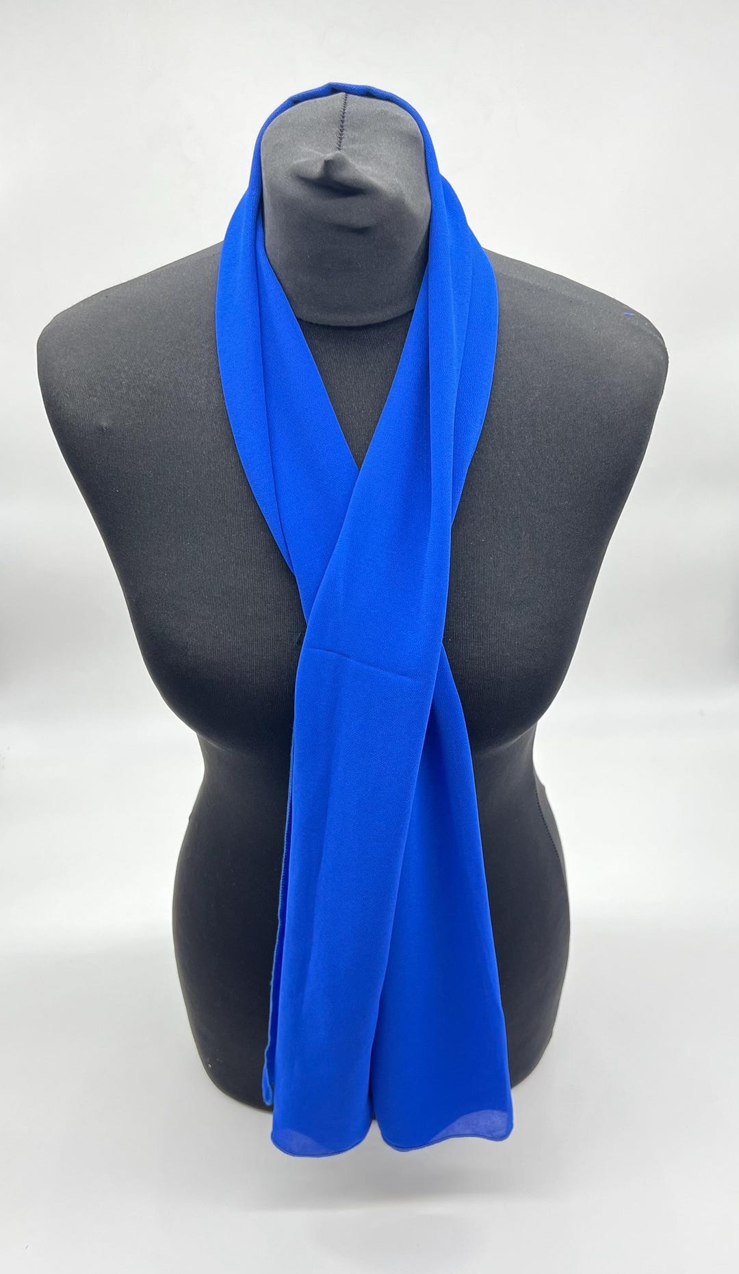 A royal blue chiffon scarf for special occasions