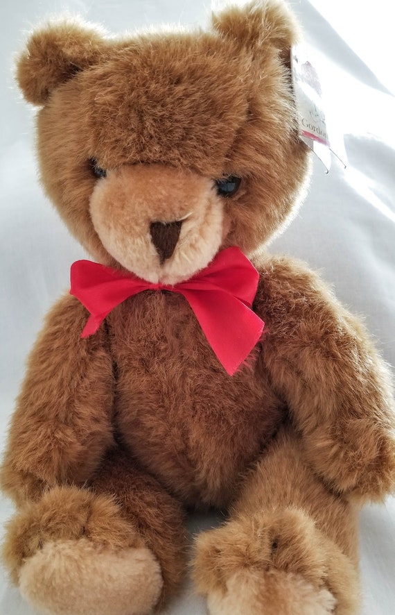 teddy bear with red bow