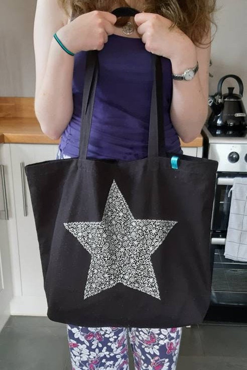 large silver beach bag