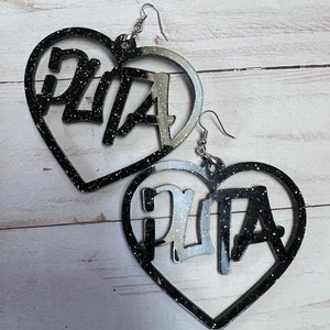 Black glitter acrylic PUTA earrings