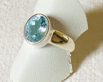 Silver ring topaz, oval faceted stone