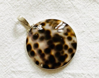 Beautiful pendant cowrie shell