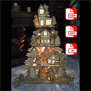 Villaggio dell'albero di Natale dell'archivio di vettore. Lima tagliata al laser