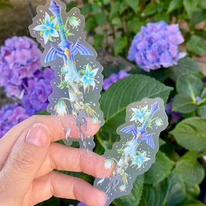 Autocollant transparent 3 po. Épée de maître pourrie avec fleurs