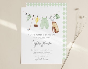 May include: A white baby shower invitation with green and white diamond pattern border. The invitation features a watercolor illustration of a clothesline with baby clothes and golf-themed items hanging on it. The text reads "A little putter is on the way" and "join us for a baby shower honoring Taylor Johnson". The date, time, and location of the shower are also included.