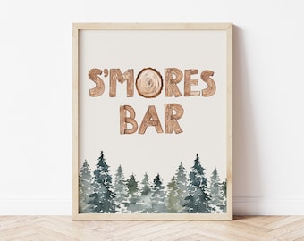 May include: A printable sign with a rustic woodgrain design that says "S'mores Bar" in brown letters. The background is a light beige with a watercolor illustration of a forest of green pine trees.