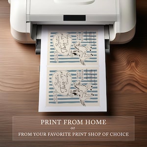 May include: A printer is shown printing two invitations with a cowboy theme. The invitations feature a cowboy riding a horse, the text "Rootin' Two-Tin Cowboy," and "Jack's 2nd Birthday." The bottom of the image reads "Print from Home or From Your Favourite Print Shop of Choice."