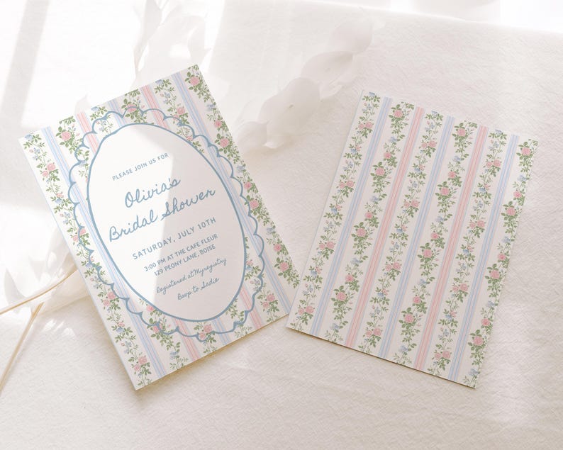 May include: A blue and white striped bridal shower invitation with a floral pattern and a scalloped border. The invitation reads "Please join us for Olivia's Bridal Shower" and includes the date, time, and location of the event.