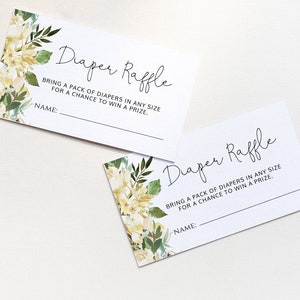 May include: Two white cards with green and yellow floral designs. The text on the cards reads "Diaper Raffle" and "Bring a pack of diapers in any size for a chance to win a prize." There is a blank line for a name on each card.