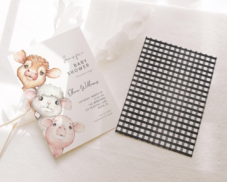 Op de afbeelding: Een baby shower uitnodiging met een aquarel illustratie van een koe, lam en varken. De uitnodiging is voor Ohvia Williams en is voor een baby shower in The Barnyard op zaterdag 19 maart om 11:00 uur. Het adres is 153 Meadow Lane, Boise, ID.