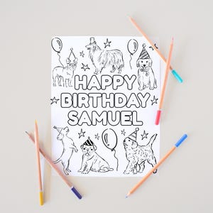 May include: A black and white line drawing of several dogs wearing party hats and holding balloons. The words "HAPPY BIRTHDAY SAMUEL" are written in the center of the image. Several colored pencils are scattered around the drawing.