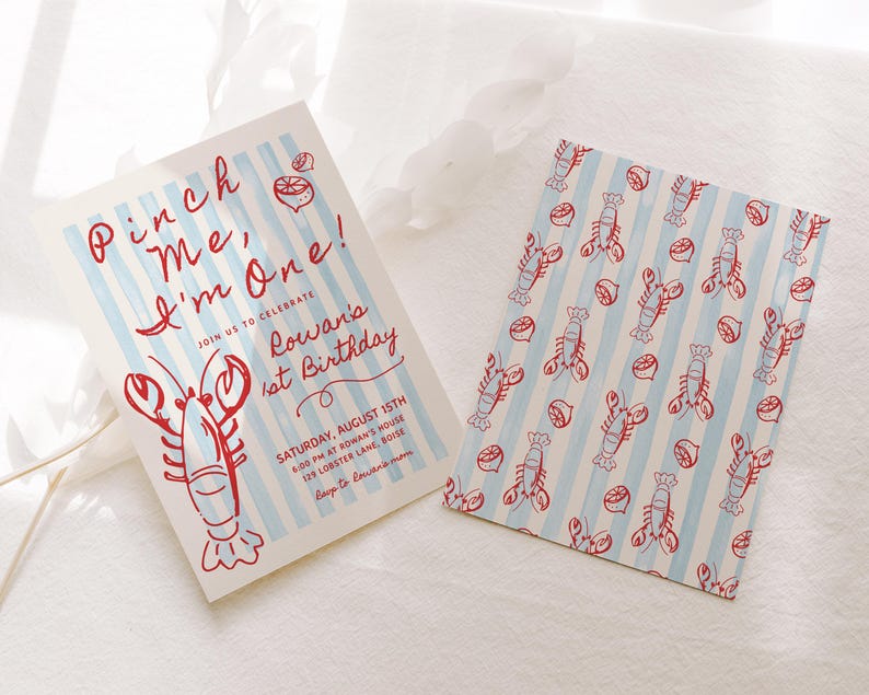 May include: Two invitations with a lobster theme. One features text "Pinch Me, I'm One!" with a lobster illustration and blue stripes. The other has a pattern of lobsters and lemons on blue stripes. The invitations are for Rowan's 1st birthday.