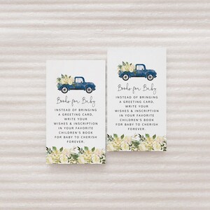 May include: Two blue and white cards with a watercolor illustration of a truck with flowers. The text on the cards reads "Books for Baby" and asks guests to write a message in a book instead of bringing a card.