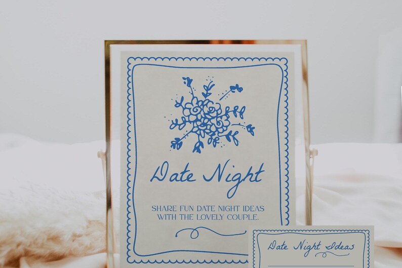 May include: A white card with blue scalloped edges and a blue floral design. The card says "Date Night" and "Share fun date night ideas with the lovely couple". A smaller white card with blue scalloped edges says "Date Night Ideas".