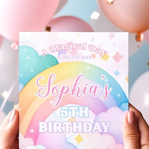 May include: A pastel rainbow with clouds and stars, a pink banner with the text "A Magical Day is on the way" and a pink banner with the text "Sophia's 5th Birthday".