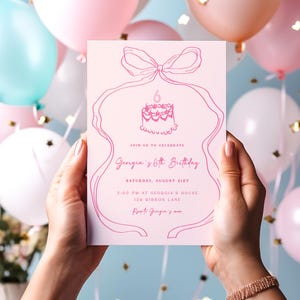 May include: Pink birthday invitation with a pink ribbon and a pink cake with a single candle. The text reads "Join us to celebrate Georgia's 6th Birthday, Saturday, August 21st, 5:00 PM at Georgia's House, 129 Ribbon Lane, RSVP Georgia's mum."