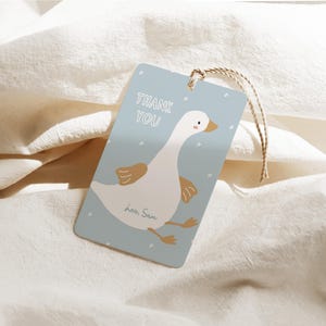 May include: A blue thank you tag with a white goose illustration and the text "Thank You" and "love Sam".
