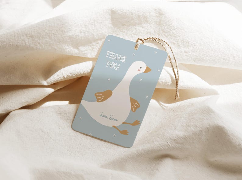 May include: A blue thank you tag with a white goose illustration and the text "Thank You" and "love Sam".