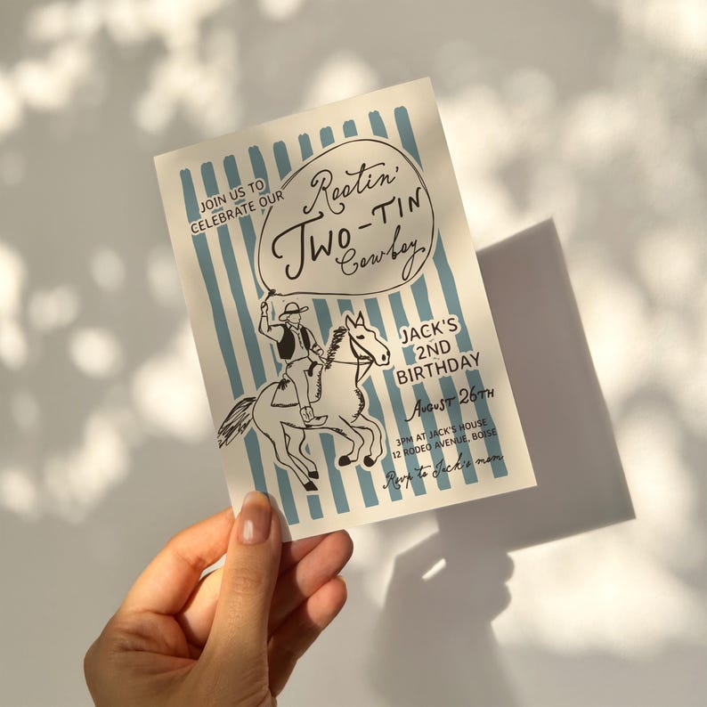 May include: A birthday invitation with a cowboy theme. The invitation features a cowboy riding a horse, with text that reads "Rootin' Two-Tin Cowboy" and "Jack's 2nd Birthday". The background has blue vertical stripes.