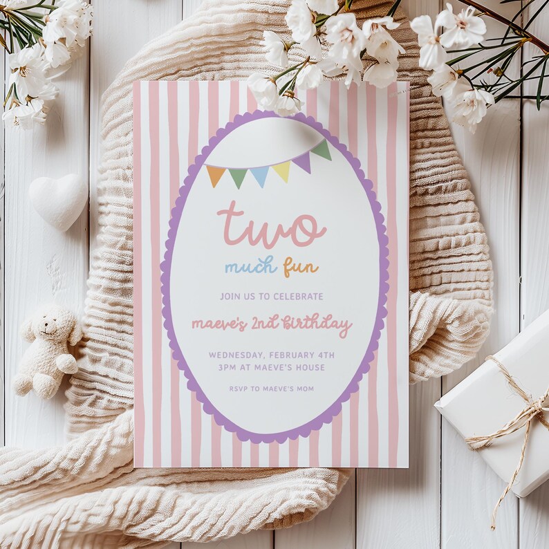 May include: A birthday invitation with a pink and white striped background. The invitation has a purple oval frame with the words "two much fun" in pink and the text "maeve's 2nd birthday". The invitation is surrounded by flowers and a small stuffed animal.