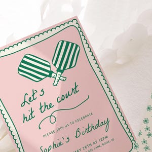 May include: Pink invitation with a green border and scalloped edges. It features a graphic of two green and white striped paddle rackets and the text "Let's hit the court" and "Sophie's Birthday".