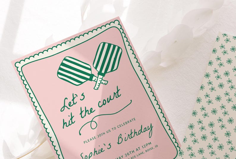 May include: Pink invitation with a green border and scalloped edges. It features a graphic of two green and white striped paddle rackets and the text "Let's hit the court" and "Sophie's Birthday".