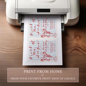 May include: A printer is shown printing two invitations with a lobster graphic and the text "Pinch Me, I'm One!" in red. The invitations have blue and white stripes. The text "Lowan's 1st Birthday" is also visible. The bottom of the image reads "Print from Home or From Your Favorite Print Shop of Choice."