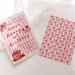May include: Pink and white striped invitation with red illustrations of strawberries and bows. The text reads "Please join us to celebrate Olivia's Berry 1st Birthday. Saturday, July 10th, 3PM at Olivia's House, 129 Strawberry Lane, San Diego.  Bays to Olivia's mom."