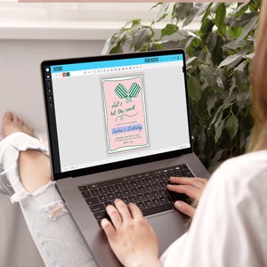 May include: A laptop screen displaying a pink and green printable invitation with the text "Let's hit the court" and "Sophia's Birthday".