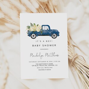 May include: A blue pickup truck with white flowers in the bed. The truck is on a white background with the text "It's a boy! Baby Shower - Honoring Madelga Mattheos" and details for the event.