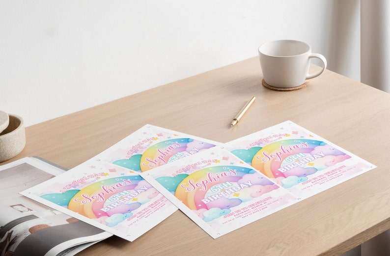 May include: Four printable invitations with a rainbow, clouds, and stars design. The invitations say "Sophia's 6th Birthday".