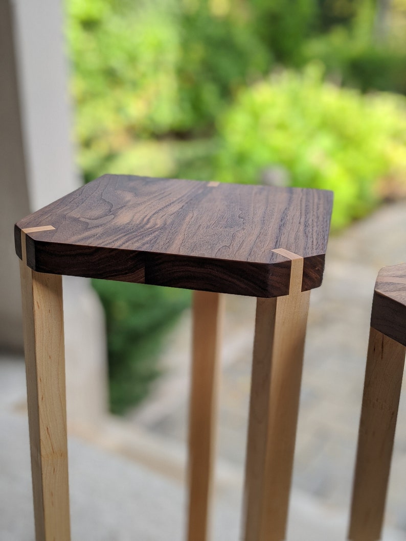 A pair of audio speaker stands 2.0 Walnut top with maple legs image 3