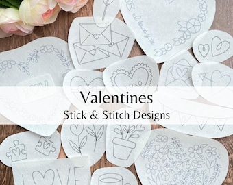 May include: A set of 12 Valentine's Day themed stick and stitch designs. The designs include hearts, flowers, envelopes, and the word "LOVE".