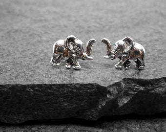 Sterling silver minimalist baby elephant earrings Stud earrings Silver elephant Gold elephant jewelry Animal earrings Nature earrings