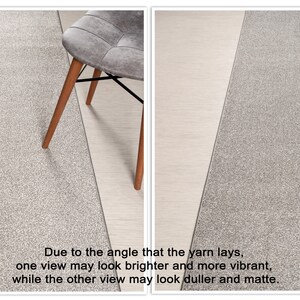 May include: Two images of a gray runner rug with a subtle texture. The rug is photographed with a wooden chair in the background. Due to the angle that the yarn lays, one view may look brighter and more vibrant, while the other view may look duller and matte.