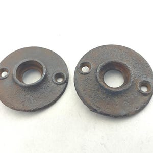 Antique vintage lot of 2 early cast-iron farmhouse primitive doorknob rosettes