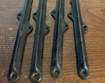 Antique vintage lot of 4 cast iron drawer glides ?