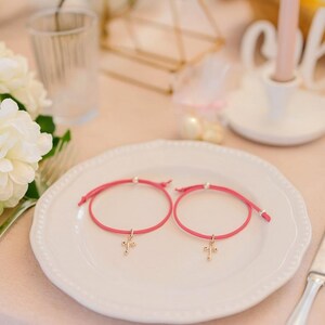 Gunsten roze kruis armband: doop, quinceanera, babyshower - set van 10