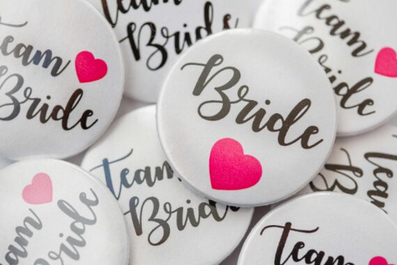 5,10,15,20x Hen party badges. Team Bride Badges 38mm. Team Bride & 1 Bride Badge. Hen do badge. Hen night badge. Team Bride. Bride Tribe