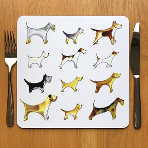 May include: A white square placemat featuring a repeating pattern of 12 different dog illustrations. The dogs are drawn in a cartoon style with watercolour-like colours.