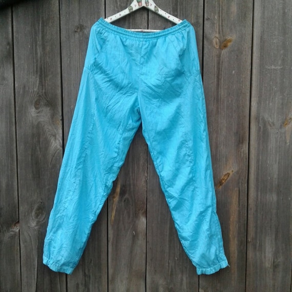 turquoise parachute pants