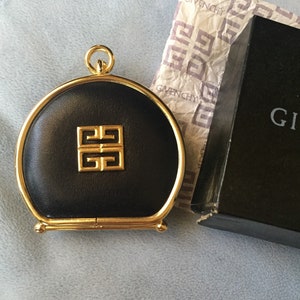 Authentische Vintage-Geldbörse aus marineblauem Leder von Givenchy mit Box und Feder