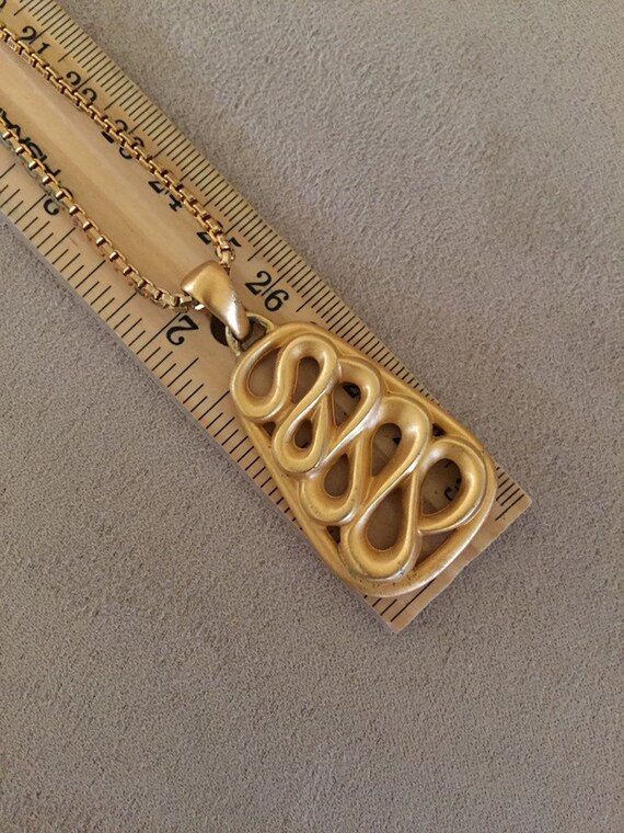 Vintage Anne Klein Matte Gold Egyptian Snake Pend… - image 1