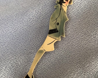 Broche estilo flapper de celuloide con estilo art déco (falta el cachorro)