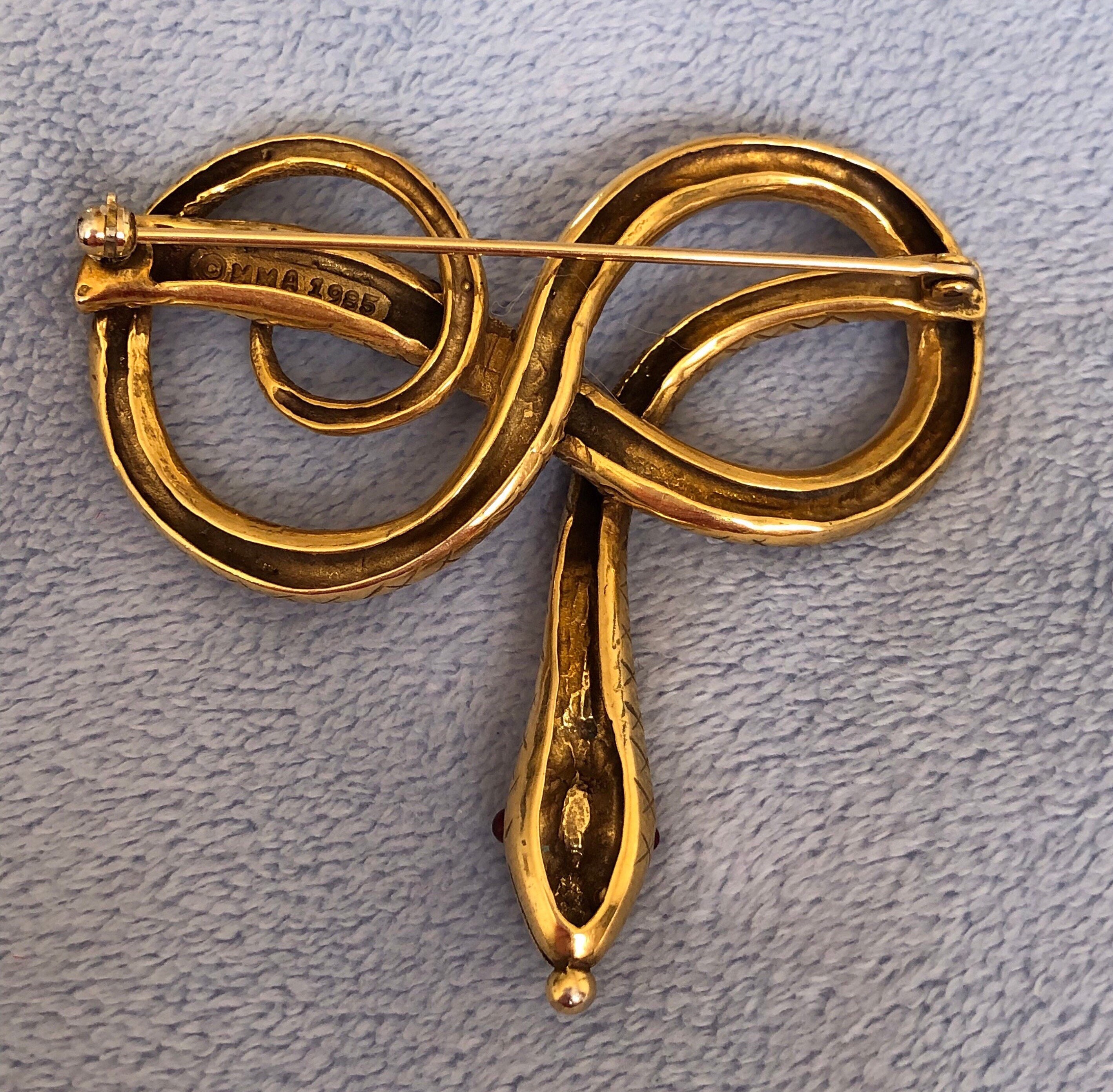 cassandre snake brooch in metal