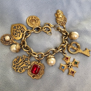 1980 French Etruscan Gold toned Charm Bracelet